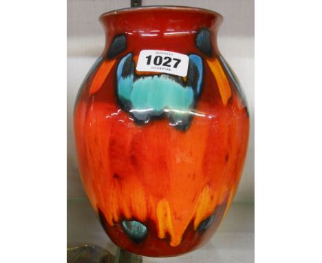 A late 20th Century Poole Pottery vase decorated with bold coloured glazing