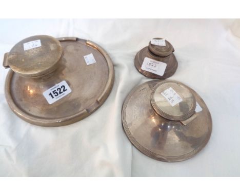 A large silver capstan inkwell with pen rest and inscription to front - sold with two other silver capstan inkwells - various