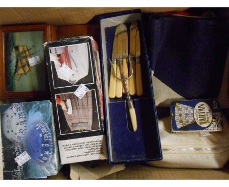 A box containing assorted collectable items including vintage maritime Union flag, Ritchie Explorer compass, etc.