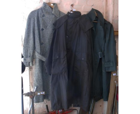 Three vintage and other coats comprising a double breasted overcoat, Country Style waxed overcoat and another