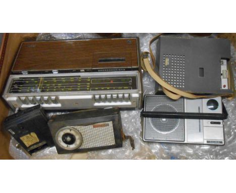 A pressed card suitcase containing five vintage transistor radios including a Phillips FTZNRU121 radio recorder, etc.