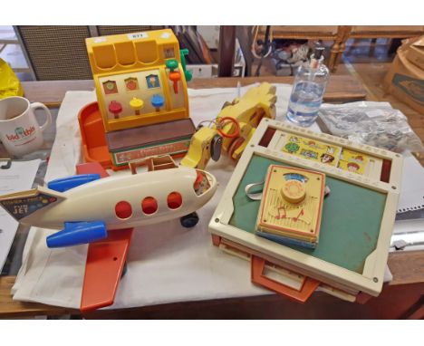 Four vintage Fisher Price toys including cash register, school days desk, Pop Goes the Weasel musical winder and fun jet - so