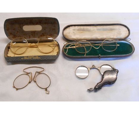 Two cased pairs of antique yellow metal framed spectacles, pinz nez and tortoiseshell sleeved lorgnette