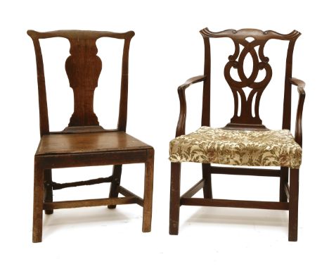 A Chippendale period mahogany elbow chair, with a pierced scrolling splat, a drop-in seat and chamfered square front legs, an