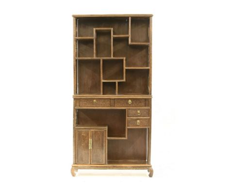 A 20th century Chinese elm open shelf, with an assortment of shelves, drawers and cupboards, 88cm wide, 26cm deep, 180cm high