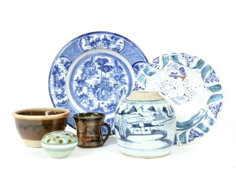 A 19th Century blue and white Dutch Delft charger, decorated with figures in a landscape in the Chinoiserie style, together w