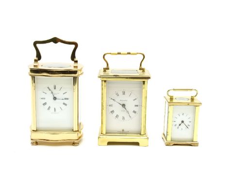 A contemporary carriage clock, dial bearing 'Bayard', together with another example 'J Horton &amp; Sons, London', and a simi