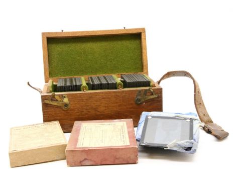 A collection of magic lantern slides, including a number of interior shots, groups of people at a shoot etc