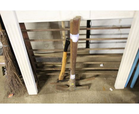 Two pick axes, sledge hammer, hand axe