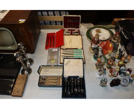 A quantity of various cased cutlery, cased darts etc.