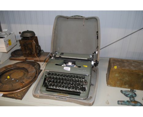 An Olympia portable typewriter 