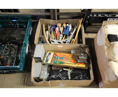 Two boxes containing various tools; to include mole grips, screwdrivers, wire brush, hammers etc.