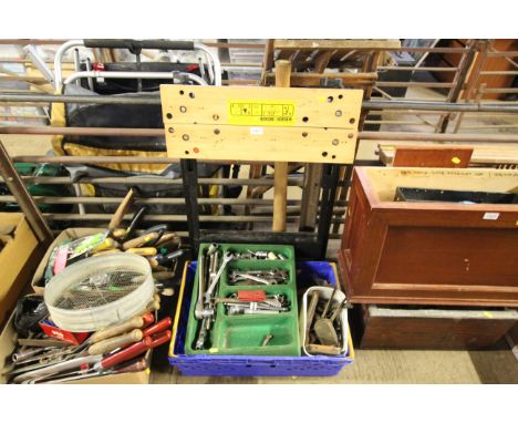 A Black &amp; Decker folding Workmate and a box of various tools; to include chisels, spanners, sockets, hand brace etc.