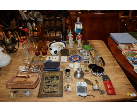 A collection of miscellaneous items to include vintage Lucas battery fillers, shaving set, playing cards, amber tinted lemona