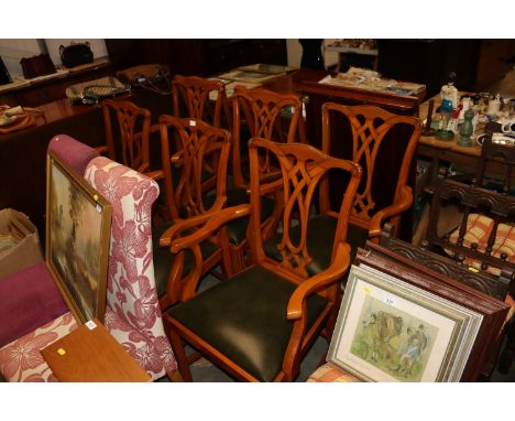 A set of eight reproduction yew wood Chippendale style elbow dining chairs