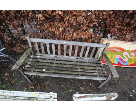 A hardwood slatted garden bench