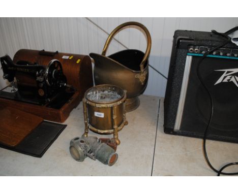 A vintage cycle lamp, brass jardinière and a brass coal helmet 