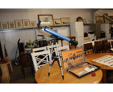 A Telmu telescope on tripod stand