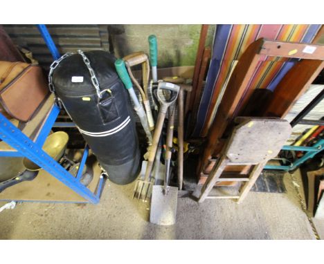 A quantity of various gardening tools to include spade, digging fork, bow saw, edger, garden shears etc