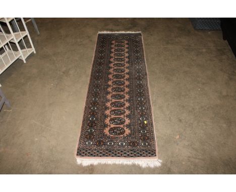 An approx. 6'5" x 2'1" Bokara patterned runner AF