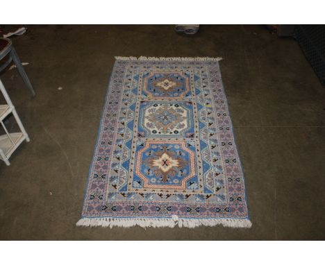 An approx. 5'2" x 2'10" eastern patterned runner