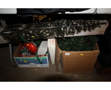 A quantity of various Christmas decorations to include a 6ft artificial Christmas tree, tinsel, lantern lights etc. 