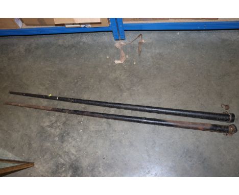 Two snooker cues in metal carrying cases
