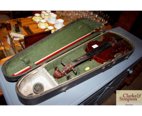 A cased violin and bow