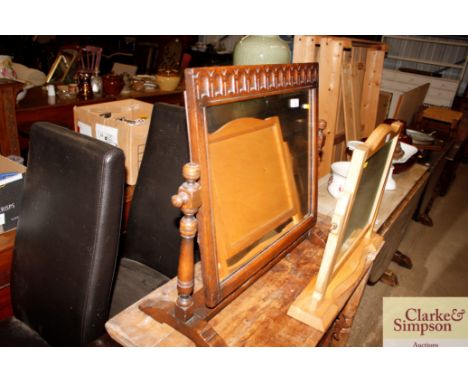A good quality oak reproduction swing toilet mirror