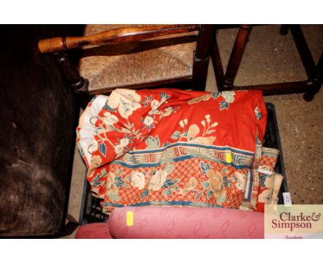 A quantity of floral patterned curtains