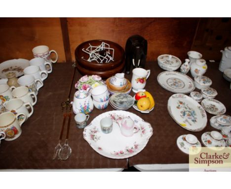 A collection of various decorative teaware, two wooden bowls, floral encrusted ornaments, ebony elephant, brass toasting fork