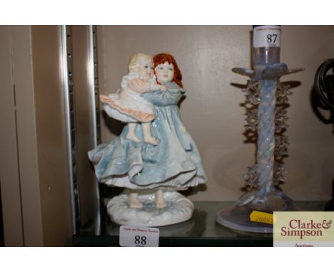 A Royal Worcester figure group "Love", limited edition inspired by the work of the NSPCC