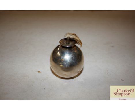 A silver grenade shaped table lighter with monogram London 1901