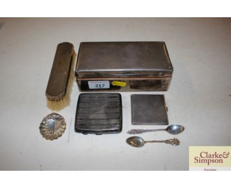A Hallmarked silver cigarette box; a cigarette case; a ladies compact; a silver mounted brush; a salt etc. 