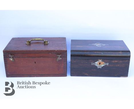 A Coromander wood writing box with inlaid mother of pearl details, key and oak wood interior measuring approx. h 17cm x w 35c