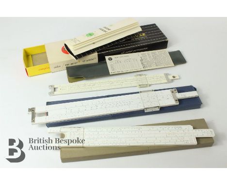 Three boxed slide rules; Pickett Simplex Trig Model N902-T with case and how to use guide, Aristo Darmstadt Nr. 967U with ins