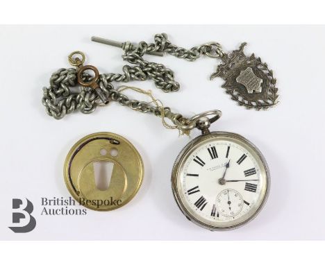 Watts &amp; Co silver open face pocket watch. The watch having a white enamel face with Roman dial&nbsp; and subsidiary secon