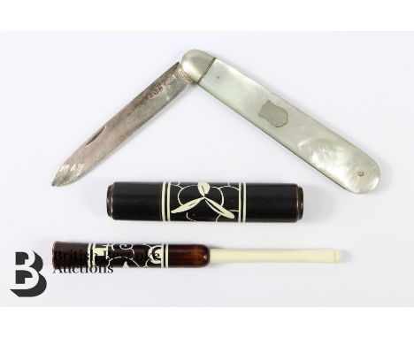 Silver and mother of pearl pen knife, Sheffield hallmark dated 1924 approx 90 mm together with a 1920 bakelite cigarette hold