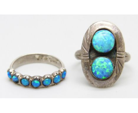 Two silver/white metal synthetic opal rings, 6.7g total, M and N
