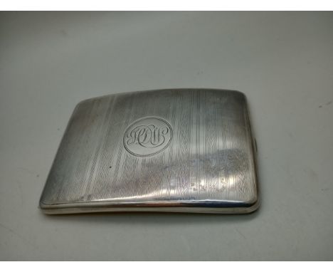A silver cigarette case with engraved monogram to front, Army Service Corps insignia and presentation inscription to Capt. H.