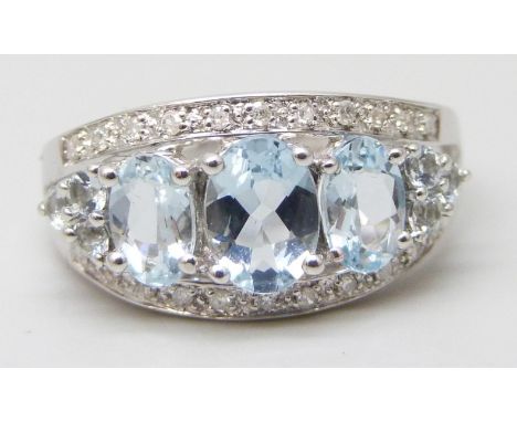 A 9ct white gold, blue stone and diamond ring, 2.9g, Q/R