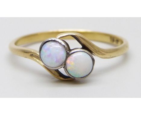 A yellow metal opal crossover ring, stamped 18ct, 2.2g, P