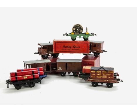 A Collection of Hornby O Gauge Freight Stock, mostly repainted or retouched, including flat wagons, gas cylinder wagons, LMS 