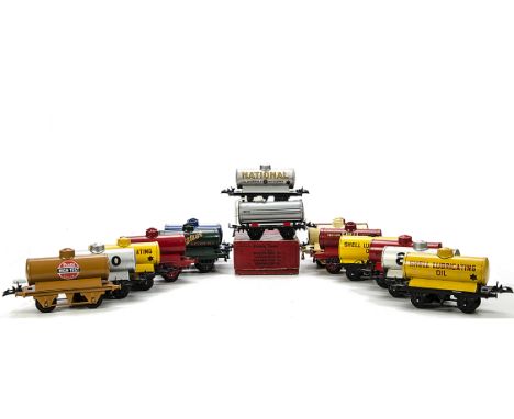 A Collection of Hornby O Gauge Tank Wagons, many repainted or retouched, including Shell spirit (red) and oil (yellow), Esso 