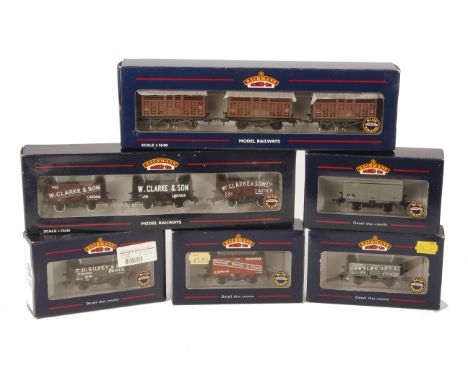 Ten OO Gauge Freight Stock by Bachmann, including 3-wagon sets 37-080U (W Clarke) and 37-700Z (BR Cattle) and four others ind