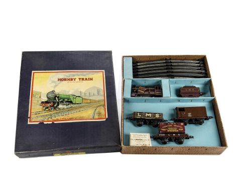 A Hornby 0 Gauge No 601 LMS Goods Train Set, comprising LMS maroon No 1 0-4-0 Engine and Tender No 5600 with tested tag, two 