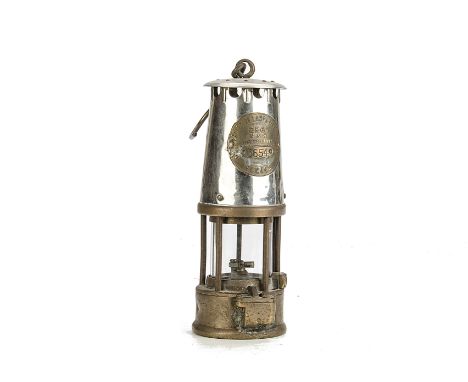 An original GR6S Miner's Safety Lamp by Protector Lamp & Lighting Co Ltd, with heavy brass base and tank, Pyrex glass gallery