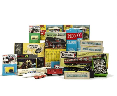 A Large Collection of OO and HO Gauge Components Scenic Accoutrements and other items, including wheels, bogies and other con
