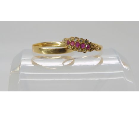 A bright yellow metal ruby and diamond ring size N, together with a 18ct gold wedding ring, weight combined 2.6gms Condition 