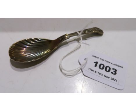 A silver caddy spoon Sheffield 1928 11 cm long Condition Report: Available upon request